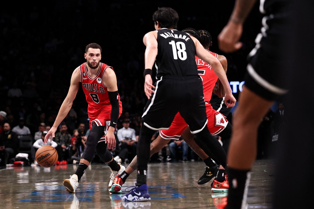 Zach LaVine #8 of the Chicago Bulls is guarded by Yuta Watanabe #18 of the Brooklyn Nets during the second quarter of the game at Barclays Center on November 01, 2022 in New York City