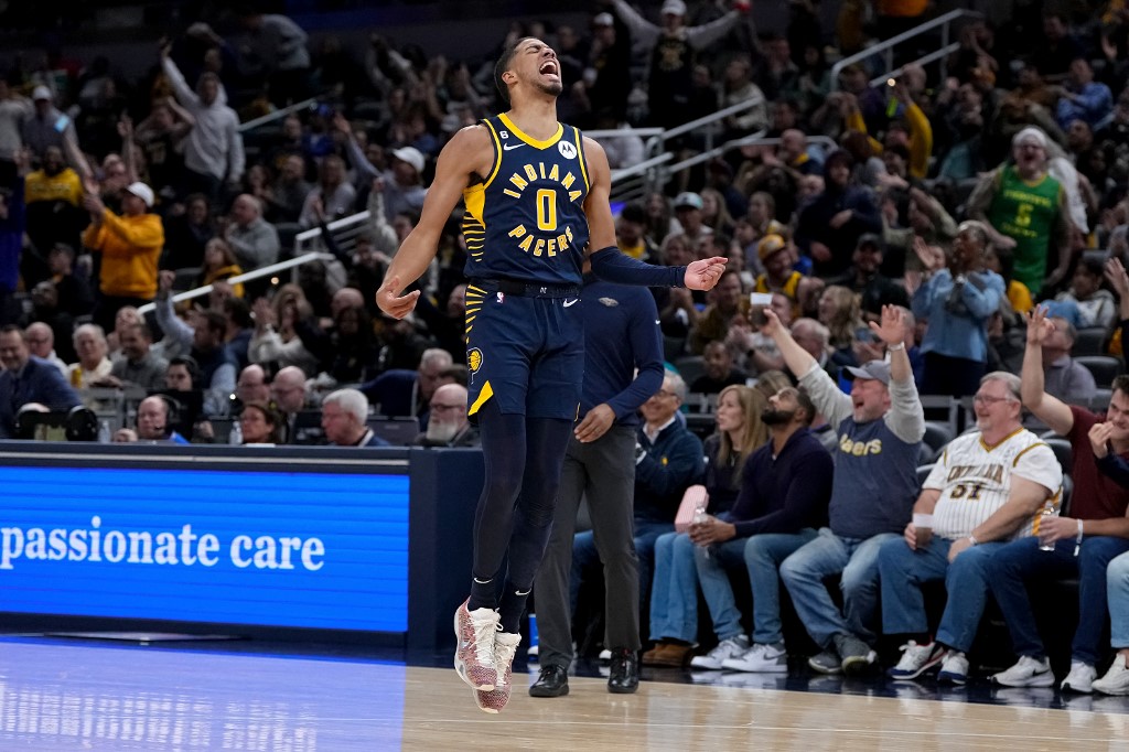 Tyrese Haliburton #0 of the Indiana Pacers reacts in the third quarter of the game against the New Orleans Pelicans at Gainbridge Fieldhouse on November 07, 2022 in Indianapolis, Indiana.