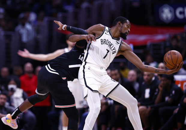 Kevin Durant carried the load again on Saturday as the Brooklyn Nets beat the Los Angeles Clippers 110-95 on Saturday for their fourth NBA win in the five games since Kyrie Irving's suspension.