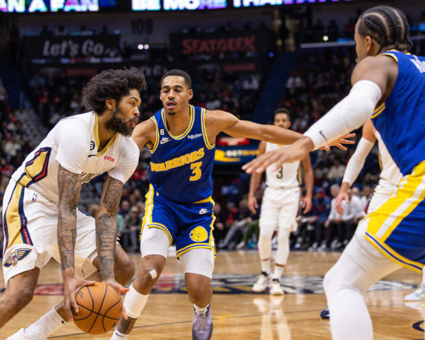 Nov 21, 2022; New Orleans, Louisiana, USA;  New Orleans Pelicans forward Brandon Ingram (14) drives to the basket against Golden State Warriors guard Jordan Poole (3) during the second half at Smoothie King Center.