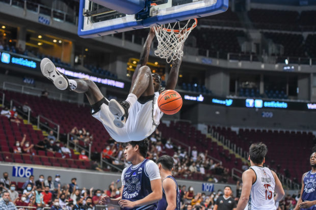 Malick Diouf hammers one down for the Maroons. UAAP MEDIA