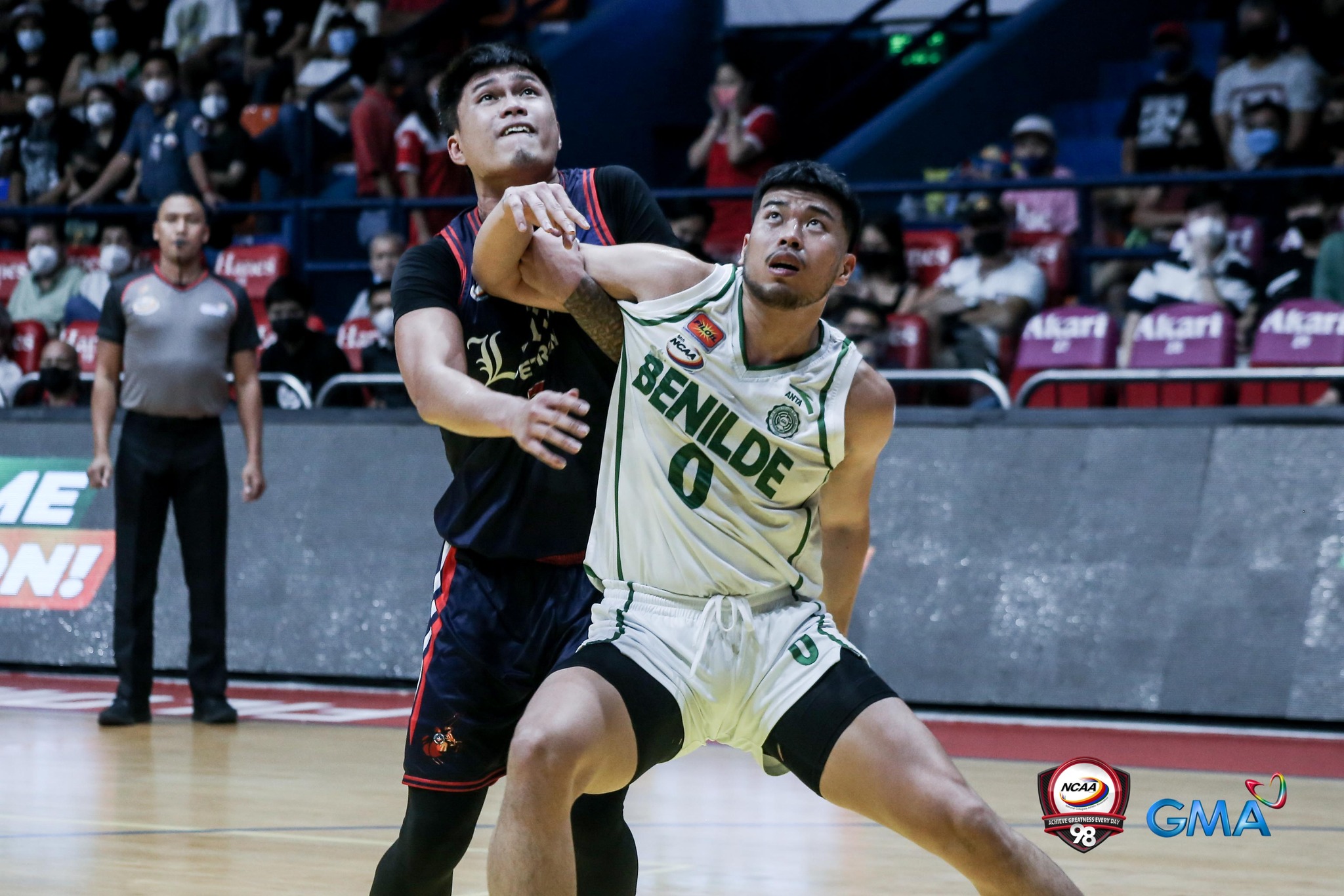 Letran and the big stars of St.  Benilde scrambled for the spot.  –NCAA photo
