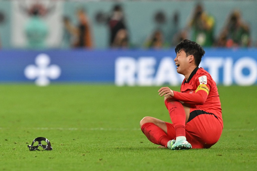 South Korea's midfielder #07 Son Heung-min celebrates his team's victory during the Qatar 2022 World Cup Group H football match between South Korea and Portugal at the Education City Stadium in Al-Rayyan, west of Doha on December 2, 2022.