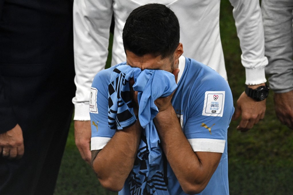 Uruguay's forward #09 Luis Suarez reacts at the end of the Qatar 2022 World Cup Group H football match between Ghana and Uruguay at the Al-Janoub Stadium in Al-Wakrah, south of Doha on December 2, 2022. 