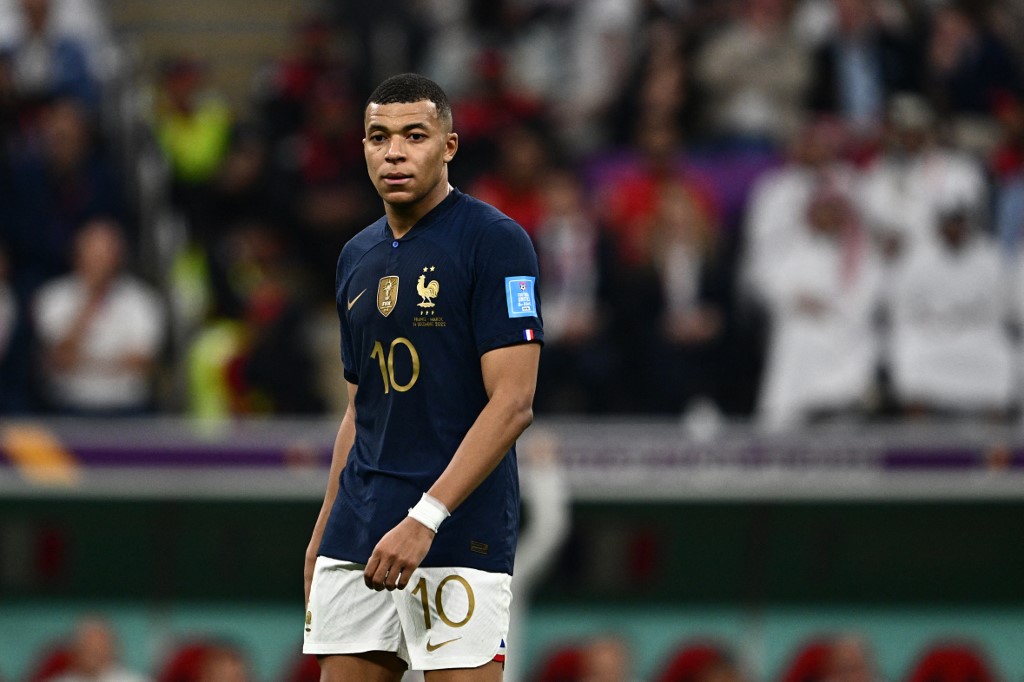 France's forward #10 Kylian Mbappe looks on during the Qatar 2022 World Cup semi-final football match between France and Morocco at the Al-Bayt Stadium in Al Khor, north of Doha on December 14, 2022. (Photo by GABRIEL BOUYS / AFP)