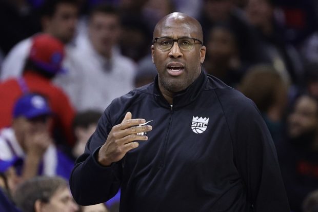 (FILES) In this file photo taken on December 13, 2022 head coach Mike Brown of the Sacramento Kings reacts during the first quarter against the Philadelphia 76ers at Wells Fargo Center. -