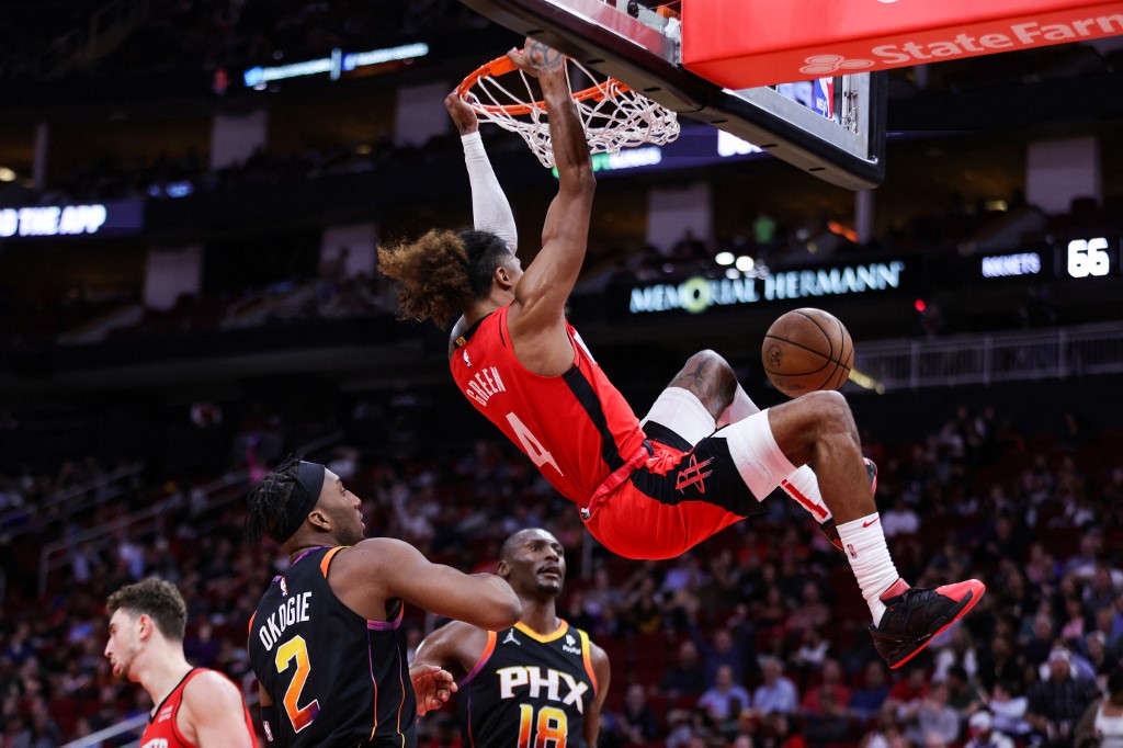 Jalen Green #4 of the Houston Rockets dunks the ball against the Phoenix Suns during the second half at Toyota Center on December 13, 2022 in Houston, Texas.