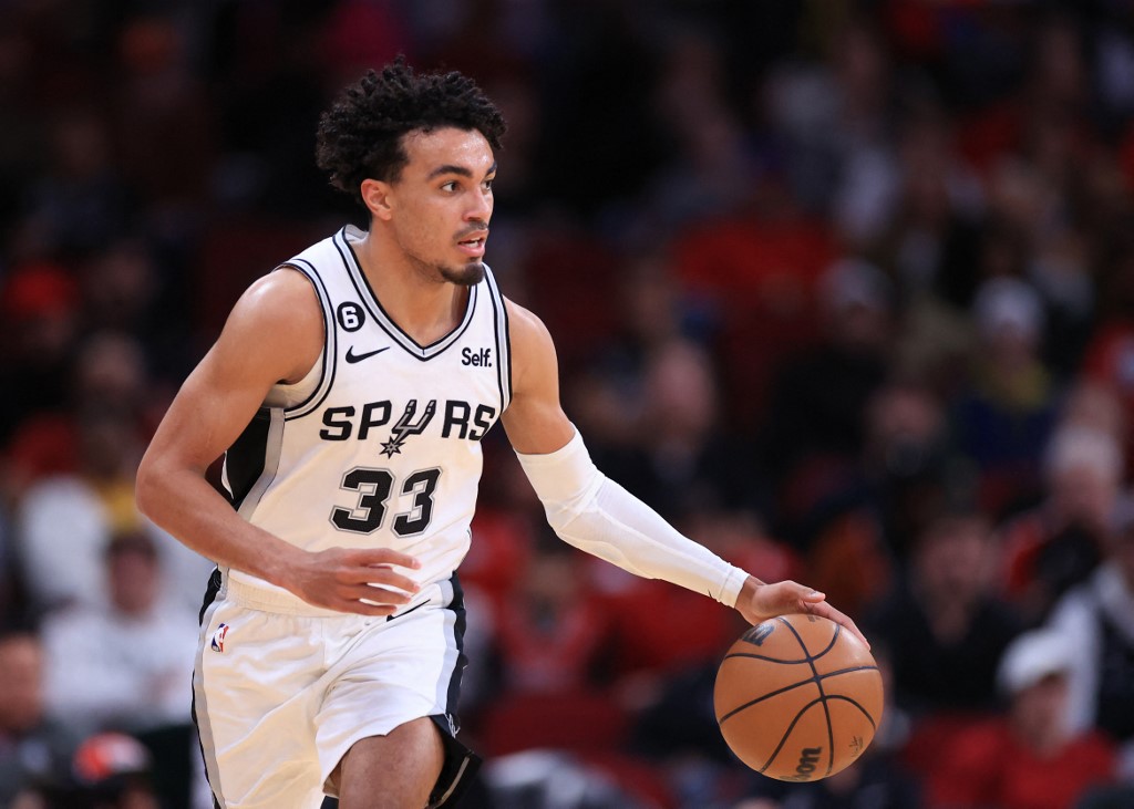  Tre Jones #33 of the San Antonio Spurs in action against the Houston Rockets at Toyota Center on December 19, 2022 in Houston, Texas. 