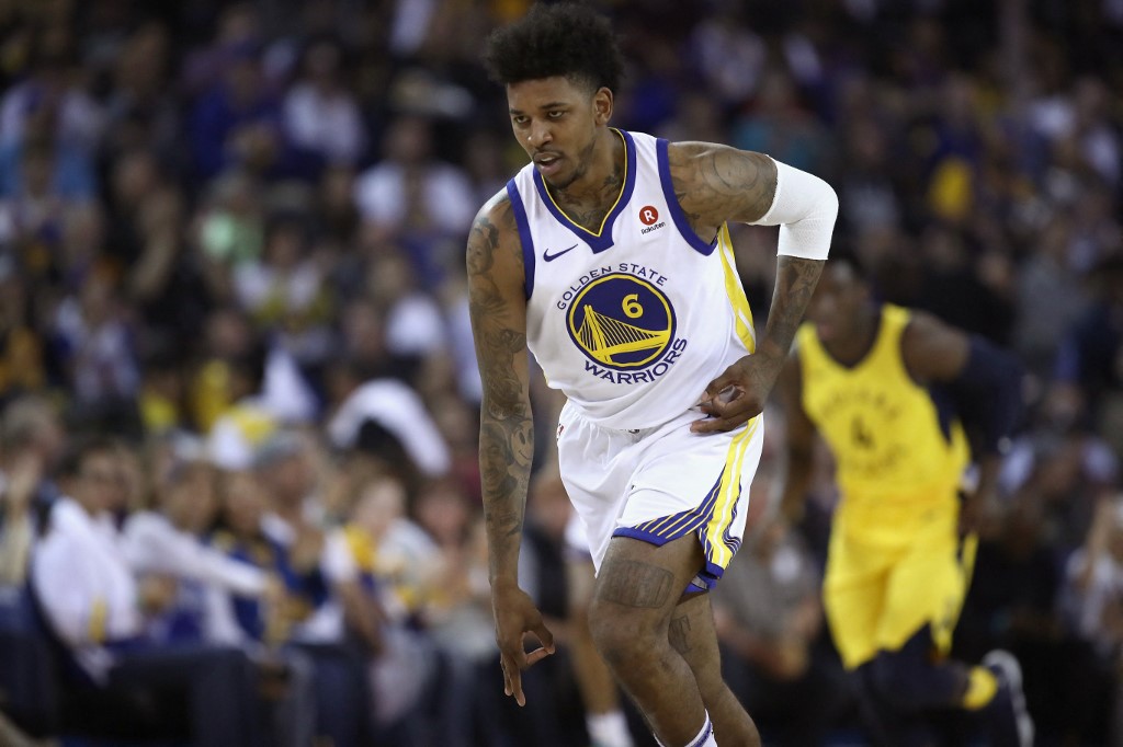Nick Young #6 of the Golden State Warriors reacts after hitting the net against the Indiana Pacers at the ORACLE Arena on March 27, 2018 in Oakland, California. 