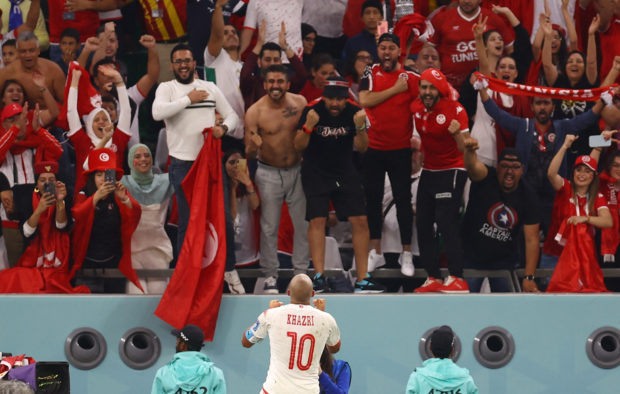 Soccer Football - FIFA World Cup Qatar 2022 - Group D - Tunisia v France - Education City Stadium, Al Rayyan, Qatar - November 30, 2022 Tunisia's Wahbi Khazri celebrates scoring their first goal in front of fans