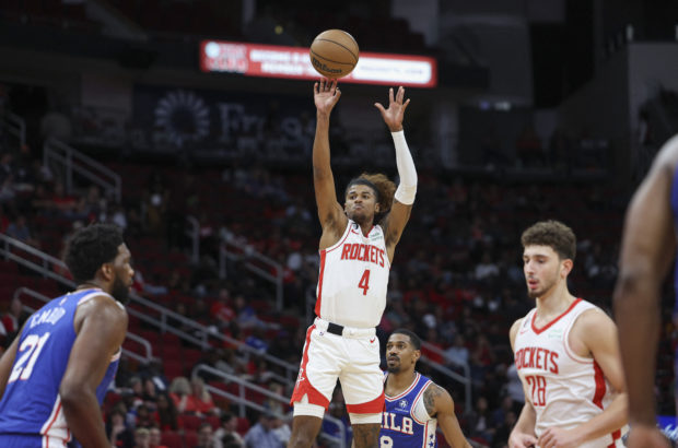 Houston Rockets defender Jalen Green (4) kicks the ball in the first half against the Philadelphia 76ers at Toyota Center. 