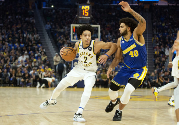  Indiana Pacers guard Andrew Nembhard (2) tries to drive around Golden State Warriors forward Anthony Lamb (40) during the first quarter at Chase Center. 