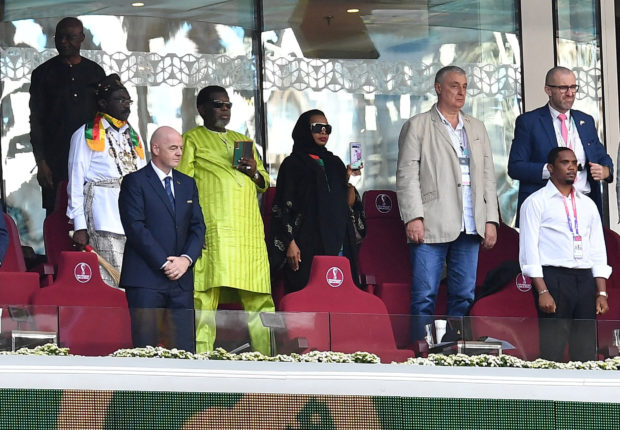 FILE PHOTO: Soccer Football - Qatar 2022 FIFA World Cup - Group G - Cameroon v Serbia - Al Janoub Stadium, Al Wakrah, Qatar - November 28, 2022 FIFA President Gianni Infantino and President Cameroon Football Federation Samuel Eto'o is pictured in the stands Before the match. 