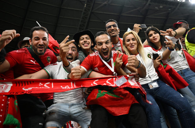  FIFA World Cup Qatar 2022 - Round of 16 - Morocco v Spain - Education City Stadium, Al Rayyan, Qatar - December 6, 2022 Morocco fans celebrate after the penalty shootout as Morocco progress to the quarter finals 