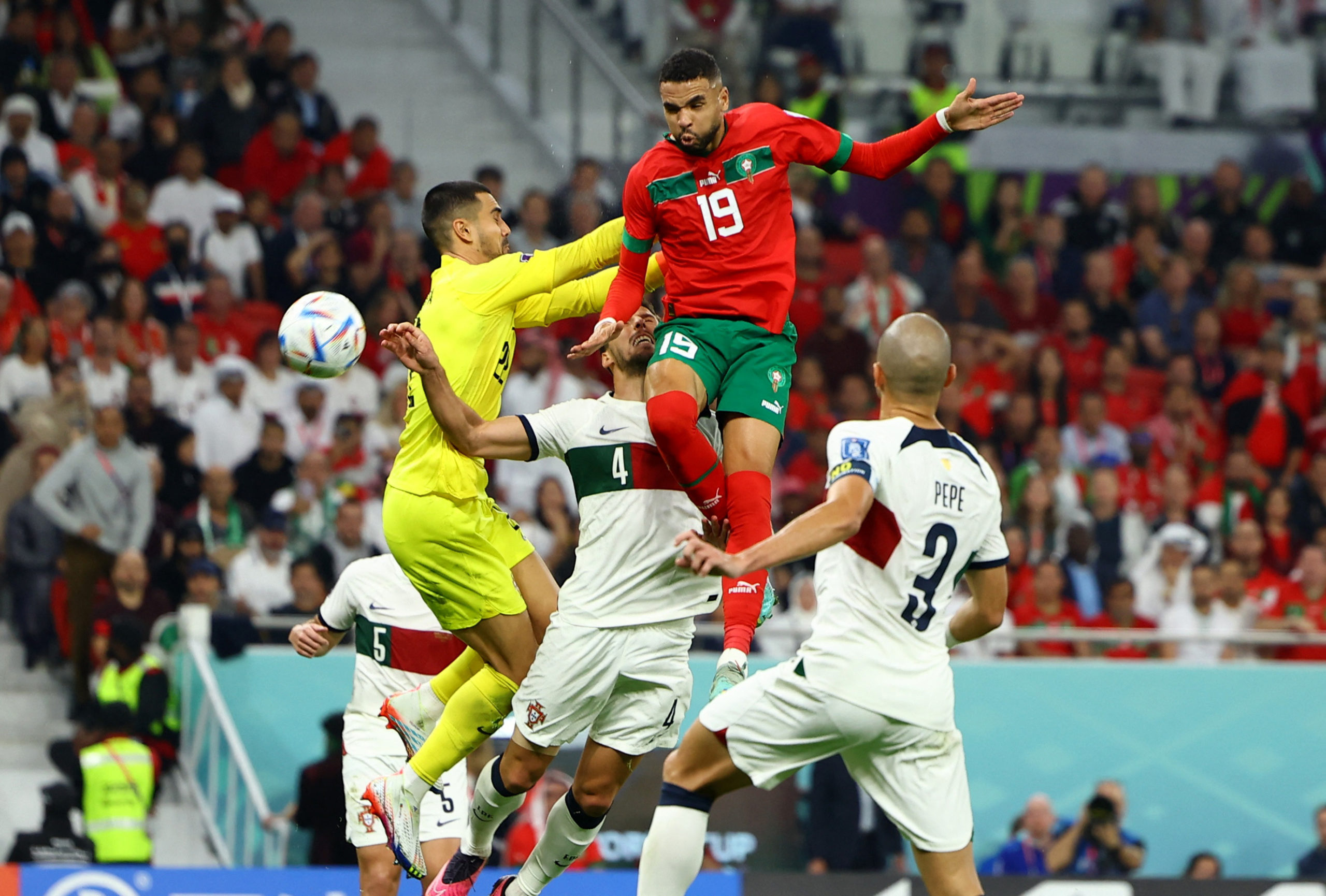 Soccer Football - FIFA World Cup Qatar 2022 - Quarter Final - Morocco v Portugal - Al Thumama Stadium, Doha, Qatar - December 10, 2022 Morocco's Youssef En-Nesyri scores their first goal 