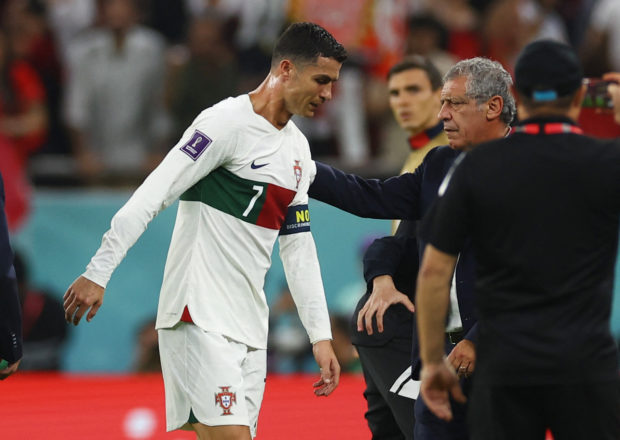 er Final - Morocco v Portugal - Al Thumama Stadium, Doha, Qatar - December 10, 2022 Portugal's Cristiano Ronaldo and coach Fernando Santos look dejected after the match as Portugal are eliminated from the World Cup