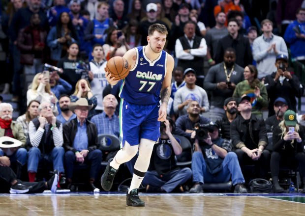 Dallas Mavericks guard Luka Doncic (77) dribbles during the second half against the New York Knicks at American Airlines Center. Mandatory Credit: