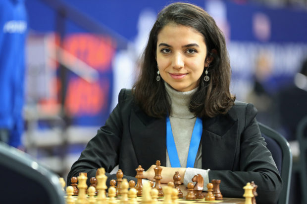 Chess - FIDE World Rapid and Blitz Championships - Rapid Women - Almaty, Kazakhstan - December 28, 2022. Sara Khadem of Iran sits in front of a chess board. 