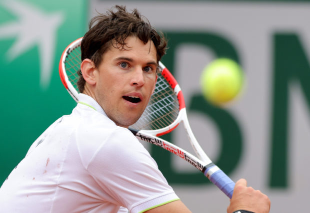 FILE PHOTO: Tennis - French Open - Roland Garros, Paris, France - May 22, 2022 Austria's Dominic Thiem in action during his first round match against Bolivia's Hugo 