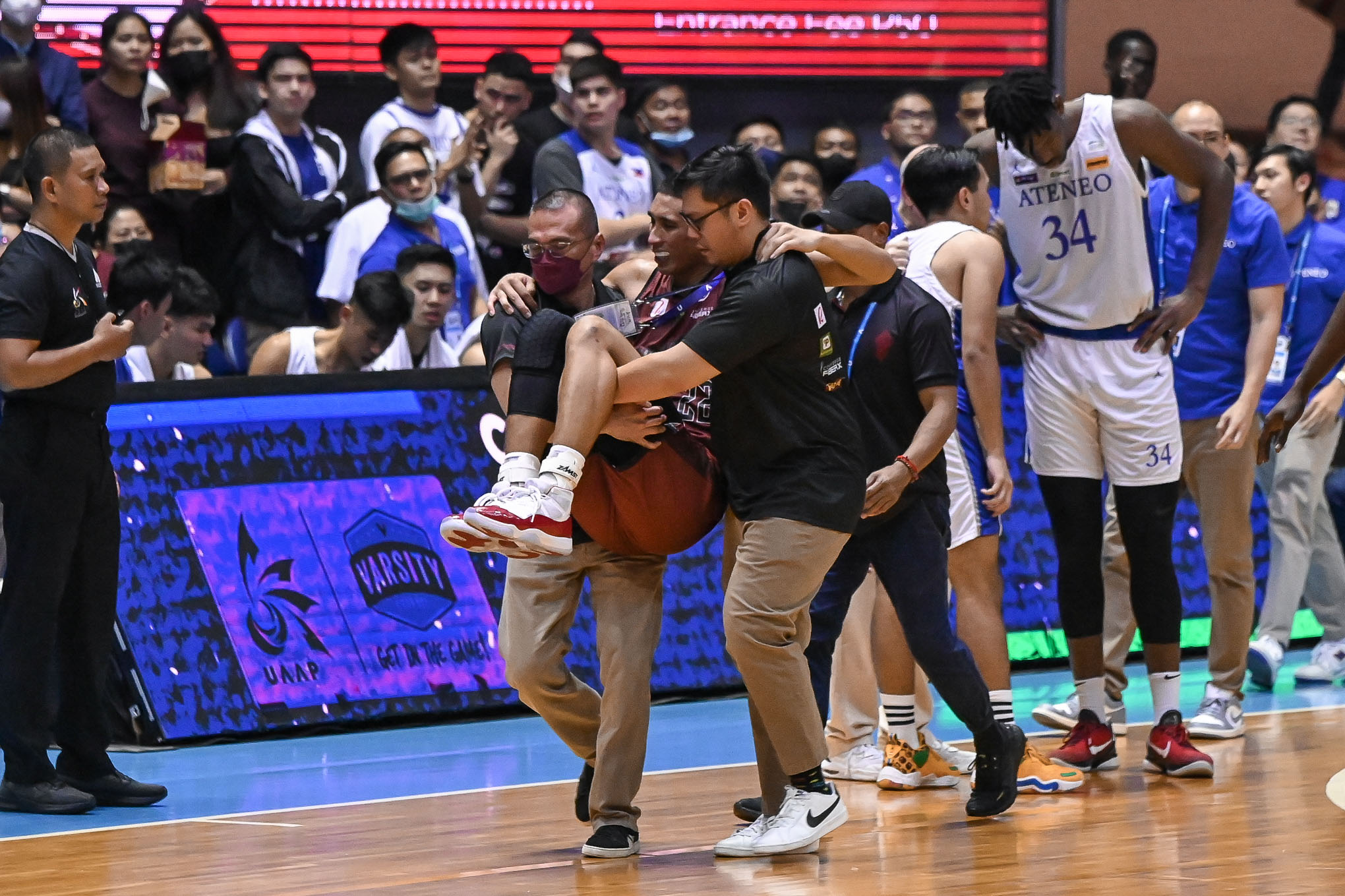 Zavier Lucero goes down late in UP's UAAP Finals Game 2 loss. –UAAP PHOTO
