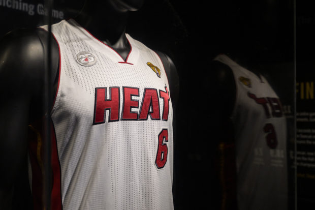 LeBron James’ game-worn jersey from the athlete’s NBA finals game 7 victory over the Miami Heat in 2013, is on display during a press preview at Sotheby's auction House on January 20, 2023, in New York City. (Photo by ANGELA WEISS / AFP)