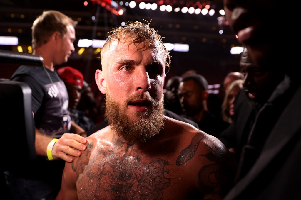Jake Paul exits the ring after his unanimous decision win over Anderson Silva of Brazil in their cruiserweight bout at Desert Diamond Arena on October 29, 2022 in Glendale, Arizona.