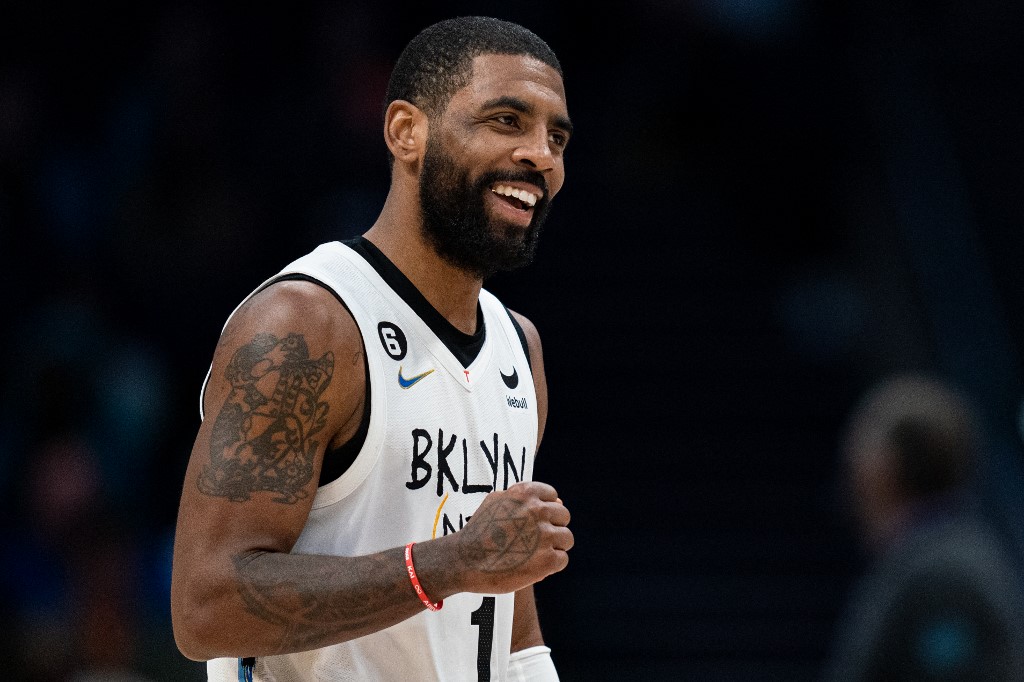 DECEMBER 31: Kyrie Irving #11 of the Brooklyn Nets reacts in the fourth quarter during their game against the Charlotte Hornets at Spectrum Center on December 31, 2022 in Charlotte, North Carolina. 