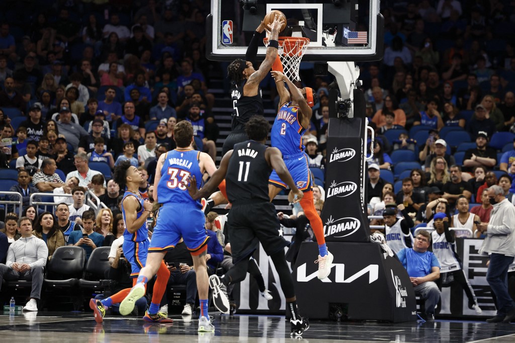  Paolo Banchero #5 of the Orlando Magic dunks the ball as Shai Gilgeous-Alexander #2 of the Oklahoma City Thunder defends during the first quarter at Amway Center on January 04, 2023 in Orlando, Florida.
