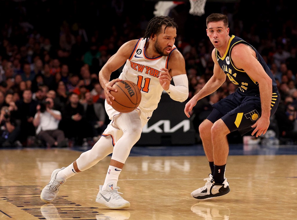 Jalen Brunson #11 of the New York Knicks heads for the net as T.J. McConnell #9 of the Indiana Pacers defends at Madison Square Garden on January 11, 2023 in New York City. 