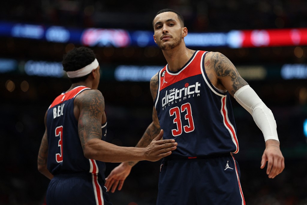 Kyle Kuzma #33 of the Washington Wizards celebrates with teammate Bradley Beal #3 against the Orlando Magic during the second half at Capital One Arena on January 21, 2023 in Washington, DC