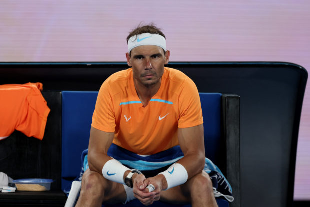 FILE PHOTO: Tennis - Australian Open - Melbourne Park, Melbourne, Australia - January 18, 2023 Spain's Rafael Nadal reacts during his second round match against Mackenzie Mcdonald of the U.S. 