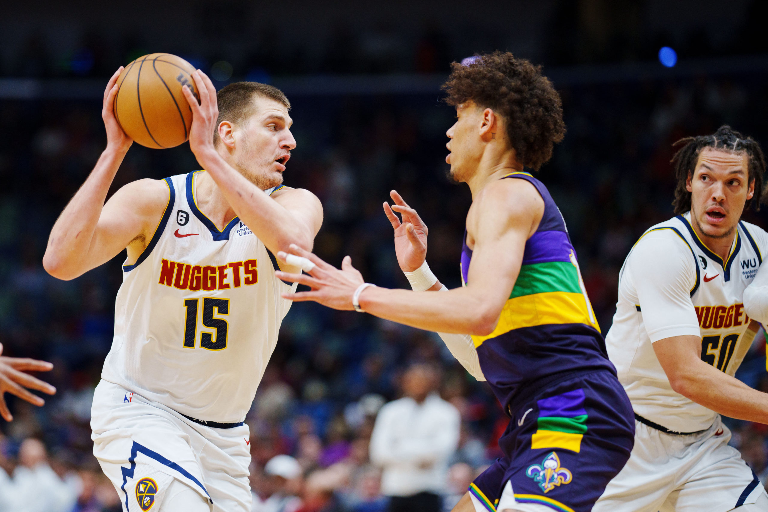 Jan 24, 2023; New Orleans, Louisiana, USA; Denver Nuggets center Nikola Jokic (15) fights for position against New Orleans Pelicans center Jaxson Hayes (10) during the first quarter at Smoothie King Center. 