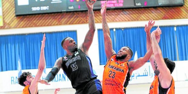 Shabazz Muhammad (in black) drops 37 points in Strong Group’s third straight win. —Contributed photo