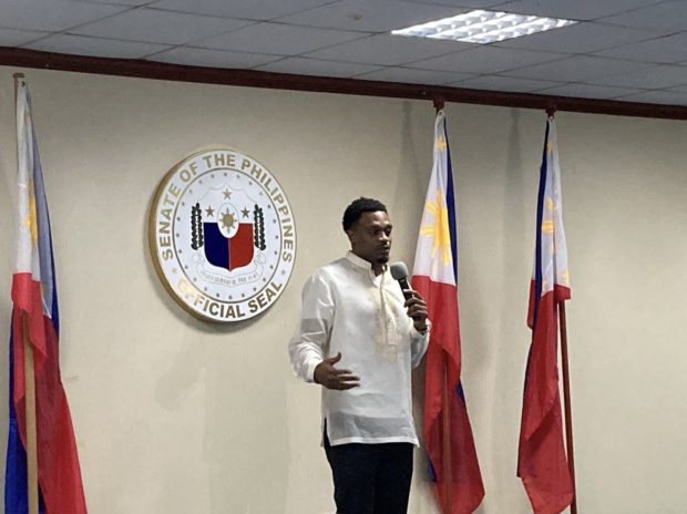 Barangay Ginebra import Justin Brownlee takes his oath of allegiance to the Philippines at the Senate in Pasay City on Monday, January 16. Photos by Daniza Fernandez