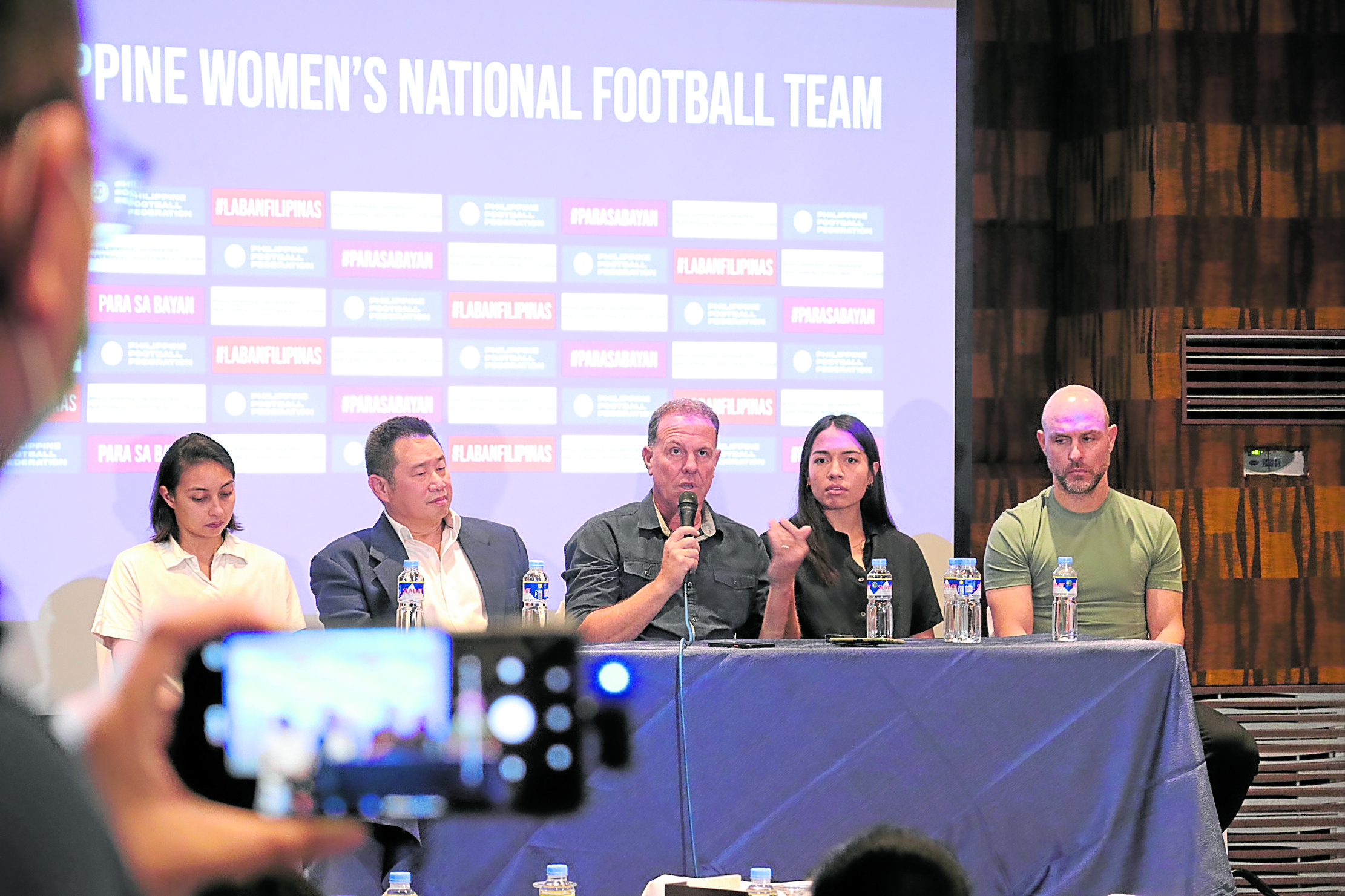 Coach Alen Stajcic (center) answers questions during the presscon together with (from left) goalkeeper Inna Palacios, team manager Jefferson Cheng, defender Hali Long and U-20 head coach Nahuel Arrarte