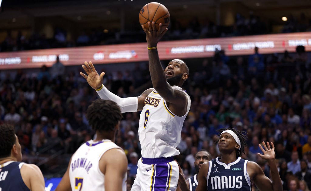  LeBron James #6 of the Los Angeles Lakers puts up a shot and scores against the Dallas Mavericks in the second half at American Airlines Center on February 26, 2023 in Dallas, Texas. 