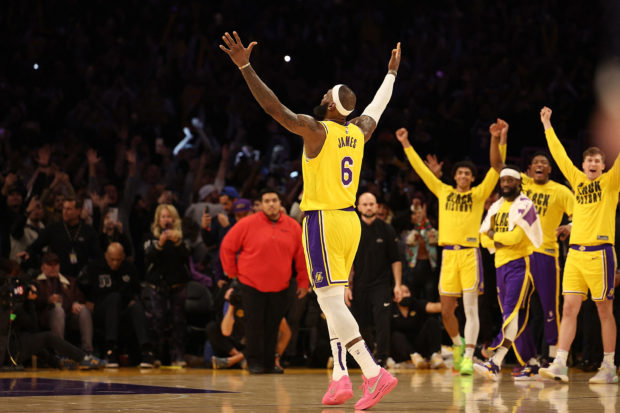 LeBron James #6 of the Los Angeles Lakers reacts after scoring to pass Kareem Abdul-Jabbar to become the NBA's all-time leading scorer, surpassing Abdul-Jabbar's career total of 38,387 points against the Oklahoma City Thunder at Crypto.com Arena on February 07, 2023 in Los Angeles, California. NOTE