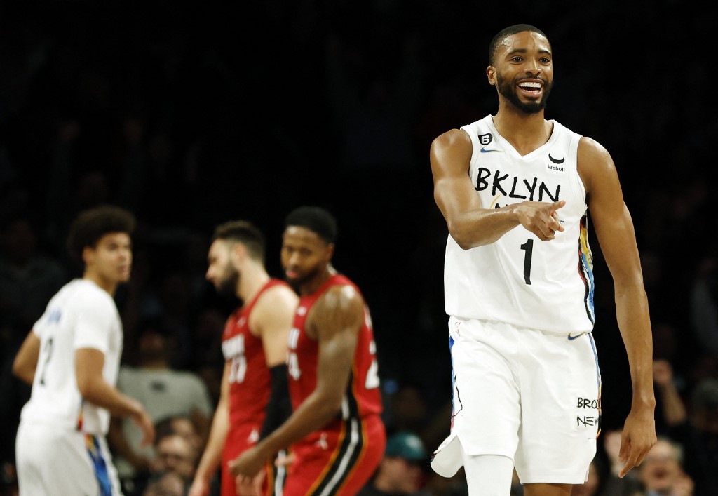 Mikal Bridges #1 of the Brooklyn Nets reacts after scoring during the second half against the Miami Heat at Barclays Center on February 15, 2023 in the Brooklyn borough of New York City.