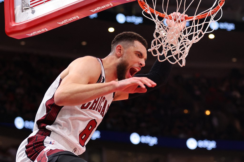  Zach LaVine #8 of the Chicago Bulls celebrates a dunk against the Brooklyn Nets during the second half at United Center on February 24, 2023 in Chicago, Illinois.