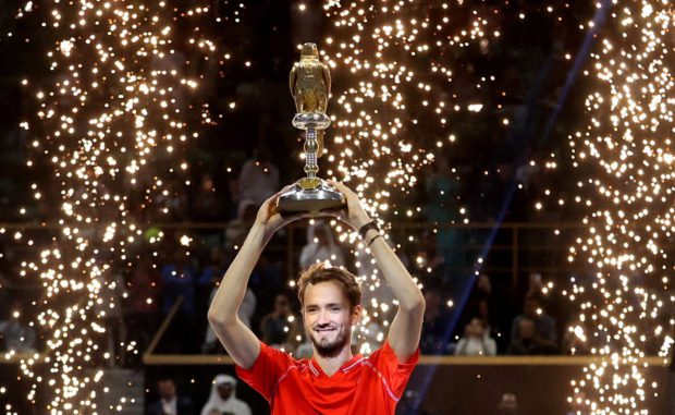 Tennis - ATP 250 - Qatar Open - Khalifa International Tennis and Squash Complex, Doha, Qatar - February 25, 2023 Russia's Daniil Medvedev celebrates with the trophy after winning his final match against Britain's Andy Murray  