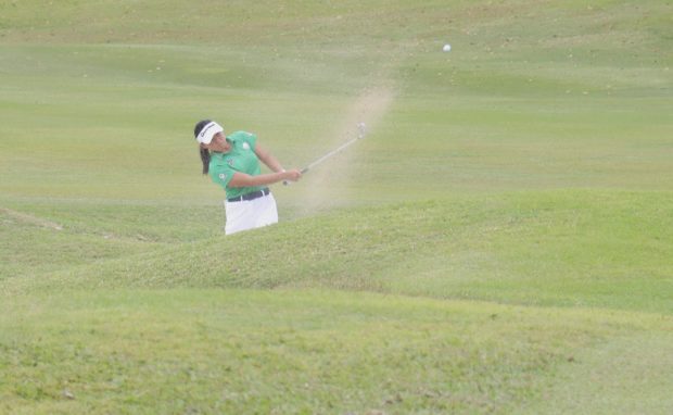 Rianne Malixi blasts out of the bunker at No. 18. —FRANCIS T. J. OCHOA