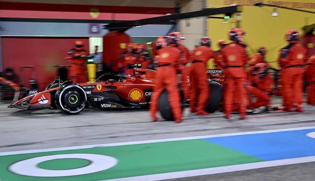 Ferrari's Spanish driver Carlos Sainz Jr leaves after a pit stop during the Bahrain Formula One Grand Prix at the Bahrain International Circuit in Sakhir on March 5, 2023. 