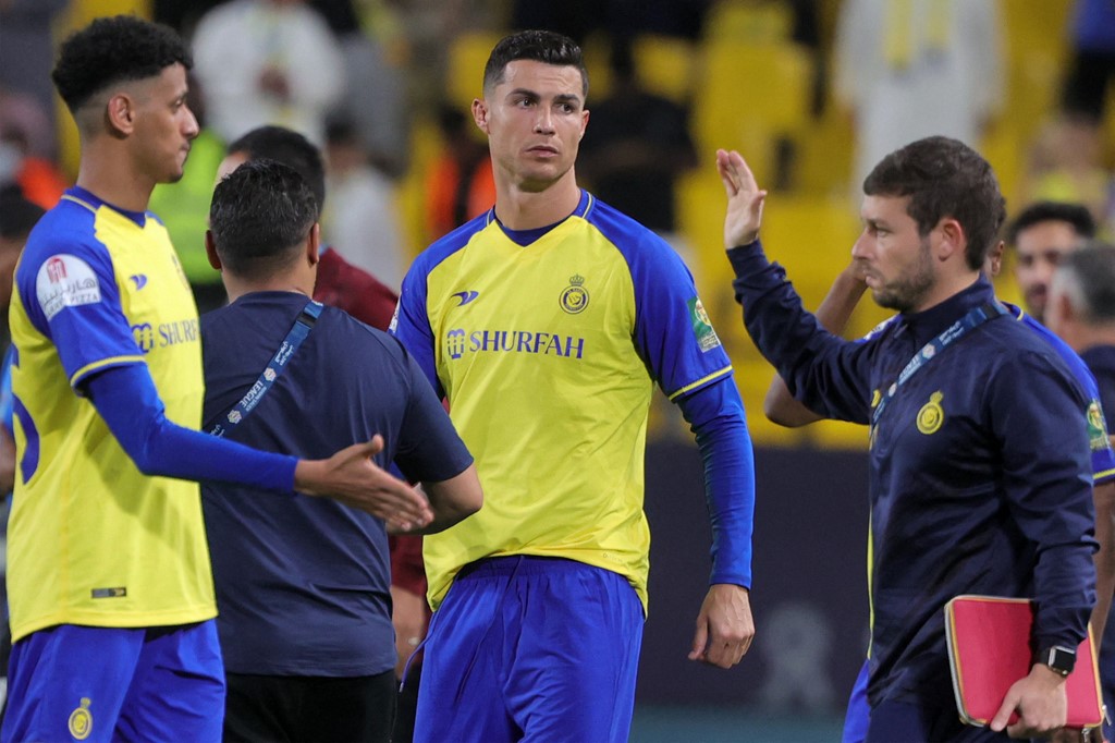 Nassr's Portuguese forward Cristiano Ronaldo (C) looks on after the King Cup quarter-final football match between al-Nassr and Abha at Mrsool Park Stadium in Riyadh on March 14, 2023.