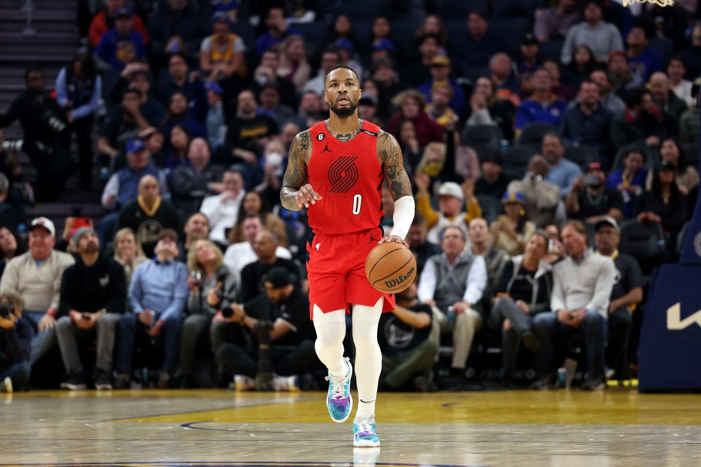  Damian Lillard #0 of the Portland Trail Blazers dribbles the ball during their game against the Golden State Warriors at Chase Center on February 28, 2023 in San Francisco, California. 