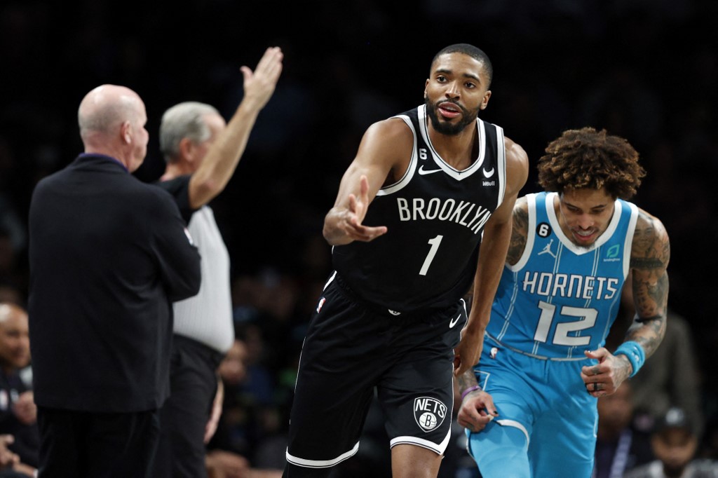  Mikal Bridges #1 of the Brooklyn Nets reacts after scoring during the second half against the Charlotte Hornets at Barclays Center on March 05, 2023 in the Brooklyn borough of New York City.