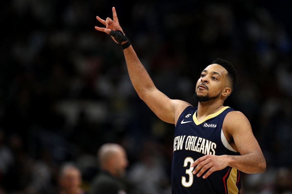 CJ McCollum #3 of the New Orleans Pelicans reacts after scoring a three-point basket during the fourth quarter of an NBA game against the Dallas Mavericks at Smoothie King Center on March 08, 2023 in New Orleans, Louisiana.
