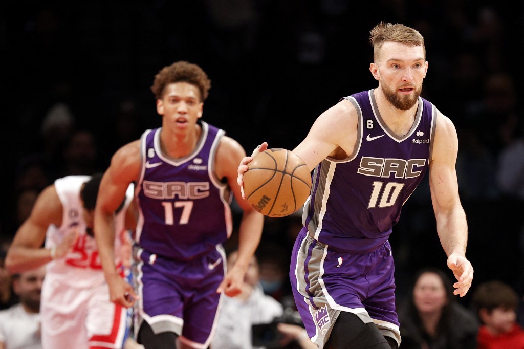 Domantas Sabonis #10 of the Sacramento Kings dribbles during the second half against the Brooklyn Nets at Barclays Center on March 16, 2023 in New York City. 