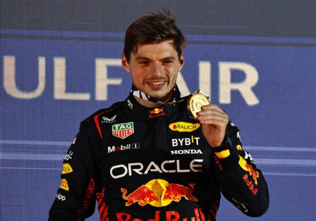 Formula One F1 - Bahrain Grand Prix - Bahrain International Circuit, Sakhir, Bahrain - March 5, 2023 Red Bull's Max Verstappen celebrates on the podium with a medal after winning the Bahrain Grand Prix 