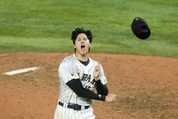 Mar 21, 2023; Miami, Florida, USA; Japan relief pitcher Shohei Ohtani (16) celebrates after defeating the USA at LoanDepot Park. Mandatory Credit: Sam Navarro-USA TODAY Sports