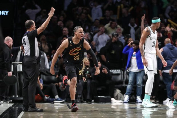 Mar 23, 2023; Brooklyn, New York, USA;  Cleveland Cavaliers forward Isaac Okoro (35) celebrates after scoring the game wining basket to beat the Brooklyn Nets 1156-114 at Barclays Center. 